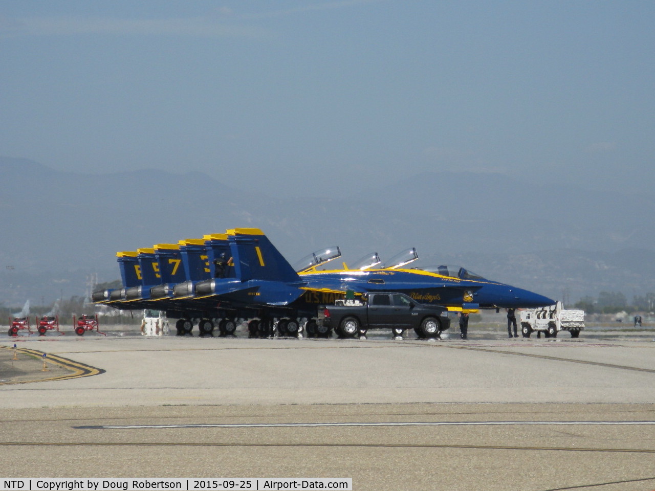 Point Mugu Nas (naval Base Ventura Co) Airport (NTD) - Five Blue Angels F/A-18C single seat and one F/A-18D dual seat (tail #7) on display on practice day before the weekend air show. two General Electric F404-GE-402 turbofans. Max speed Mach 1.8