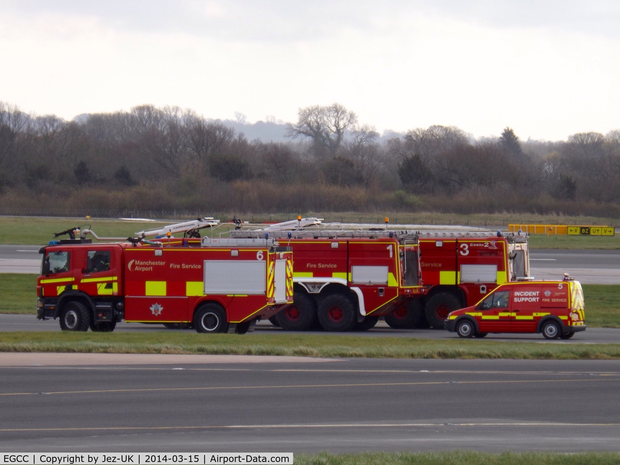 Manchester Airport, Manchester, England United Kingdom (EGCC) - some of airport fire service on standby,