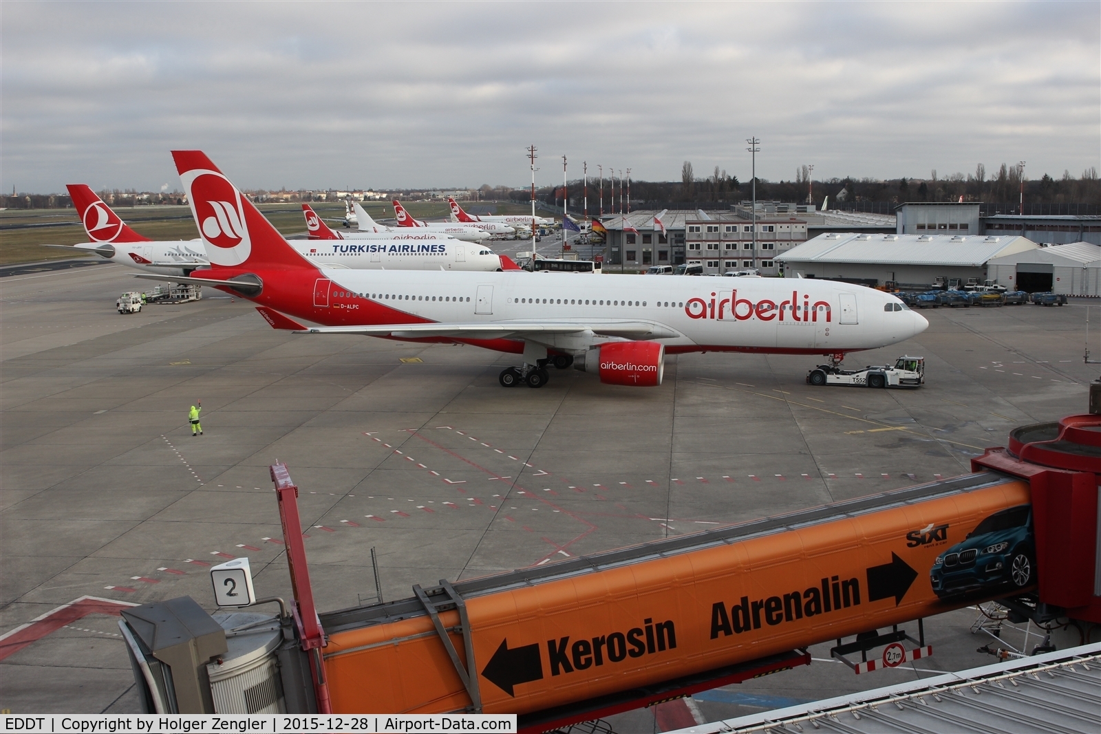 Tegel International Airport (closing in 2011), Berlin Germany (EDDT) - Red and white and an orange coloured message....