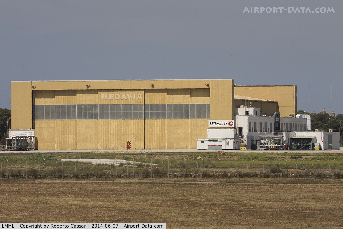 Malta International Airport (Luqa Airport), Luqa Malta (LMML) - The SR Technics hangar at Safi Apron at LMML airport. The hangar is Ex-Medavia now used to service mainly Airbus Narrow body aircraft