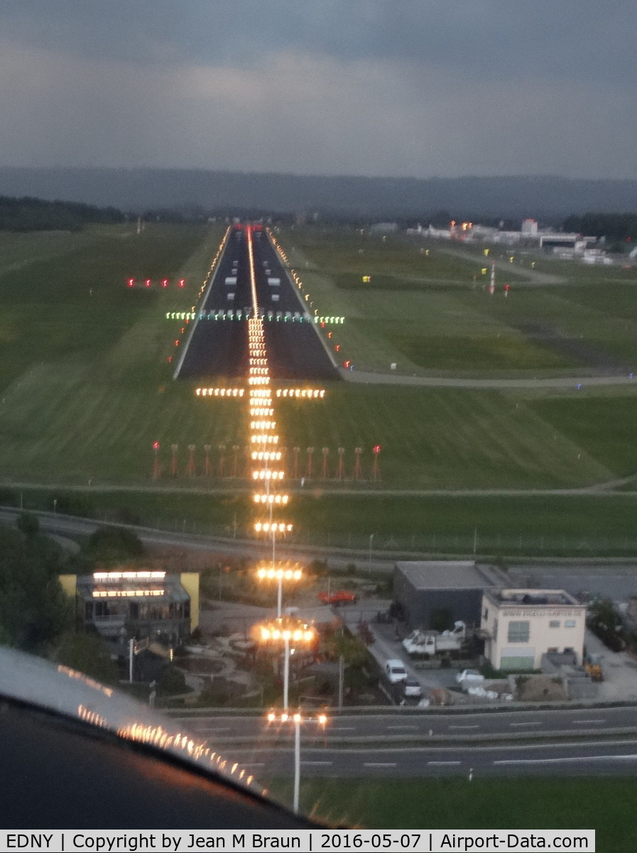 Bodensee Airport, Friedrichshafen Germany (EDNY) - Approach to land on runway 06 in the late evening