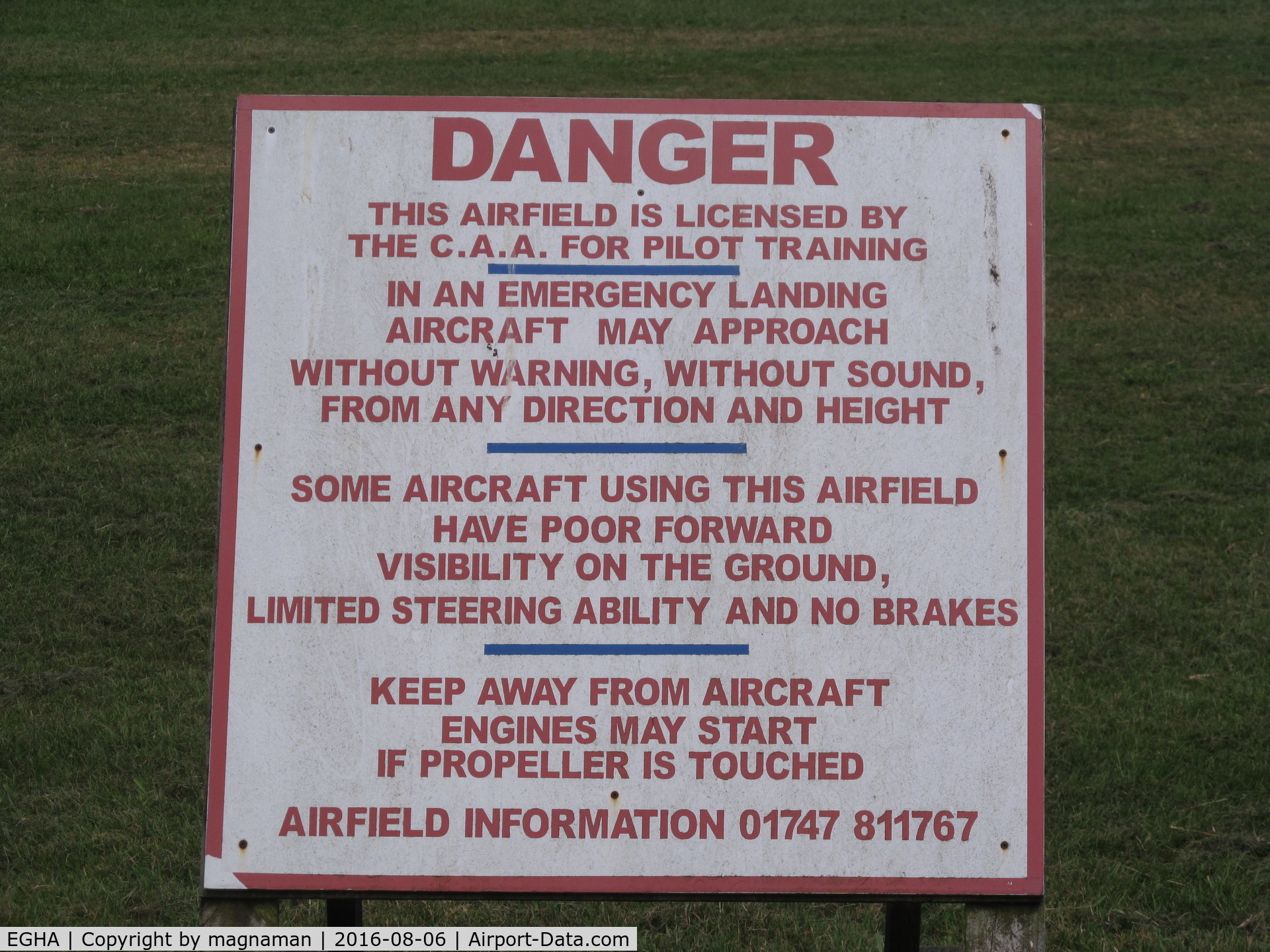 Compton Abbas Airfield Airport, Shaftesbury, England United Kingdom (EGHA) - sign next to public footpath style across runway!
