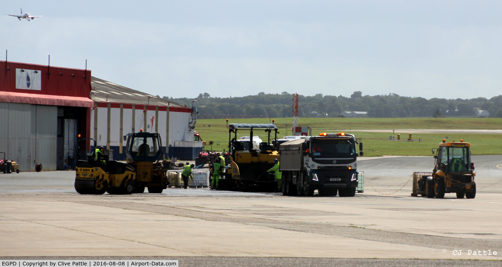 Aberdeen Airport, Aberdeen, Scotland United Kingdom (EGPD) - Re-surfacing work underway at the Babcock MCS Offshore (formerly Bond Helicopters) apron at Aberdeen