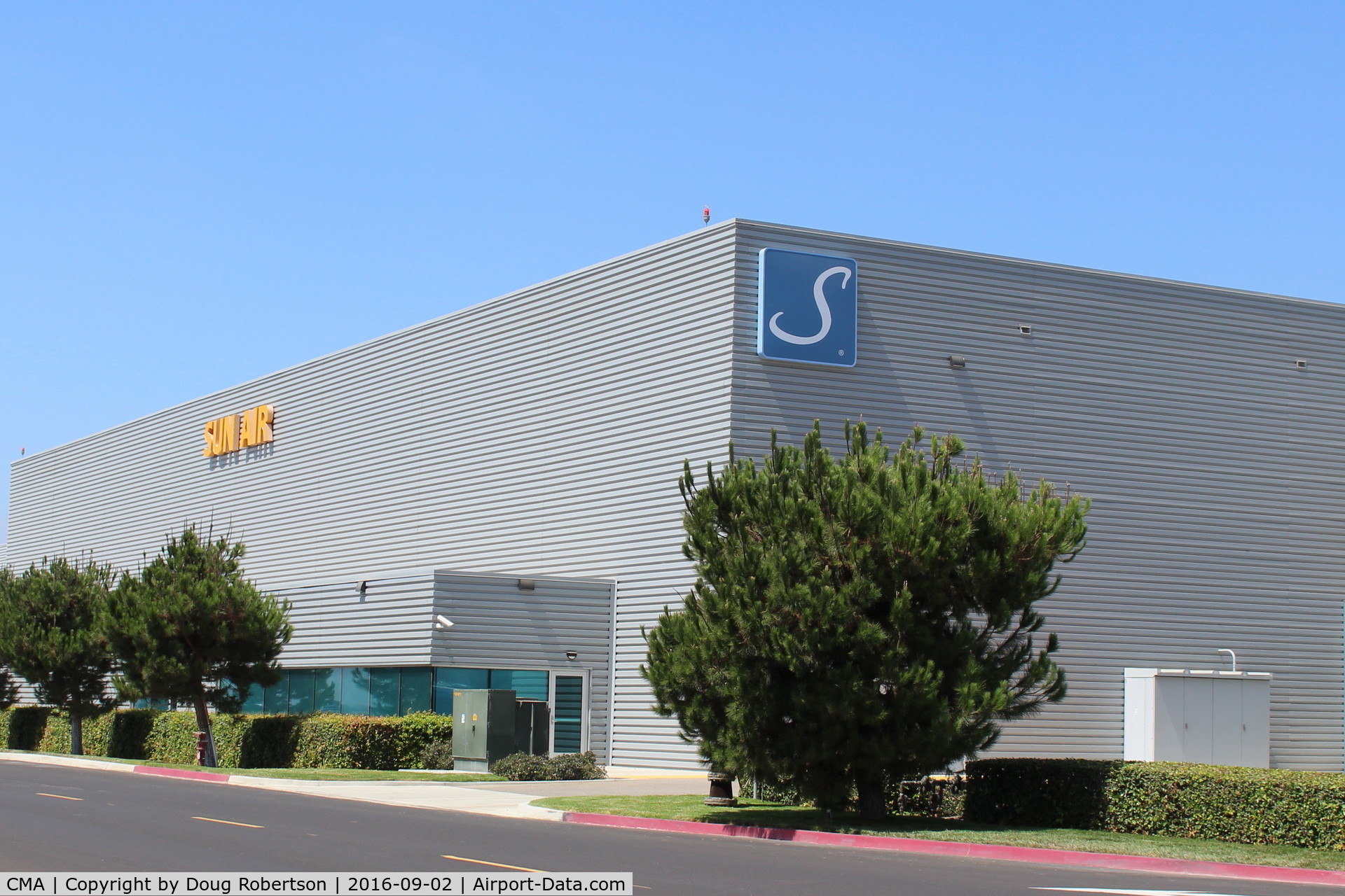 Camarillo Airport (CMA) - SUN AIR JETS, a 24/7 operation. One of their large hangars with recent new logo.