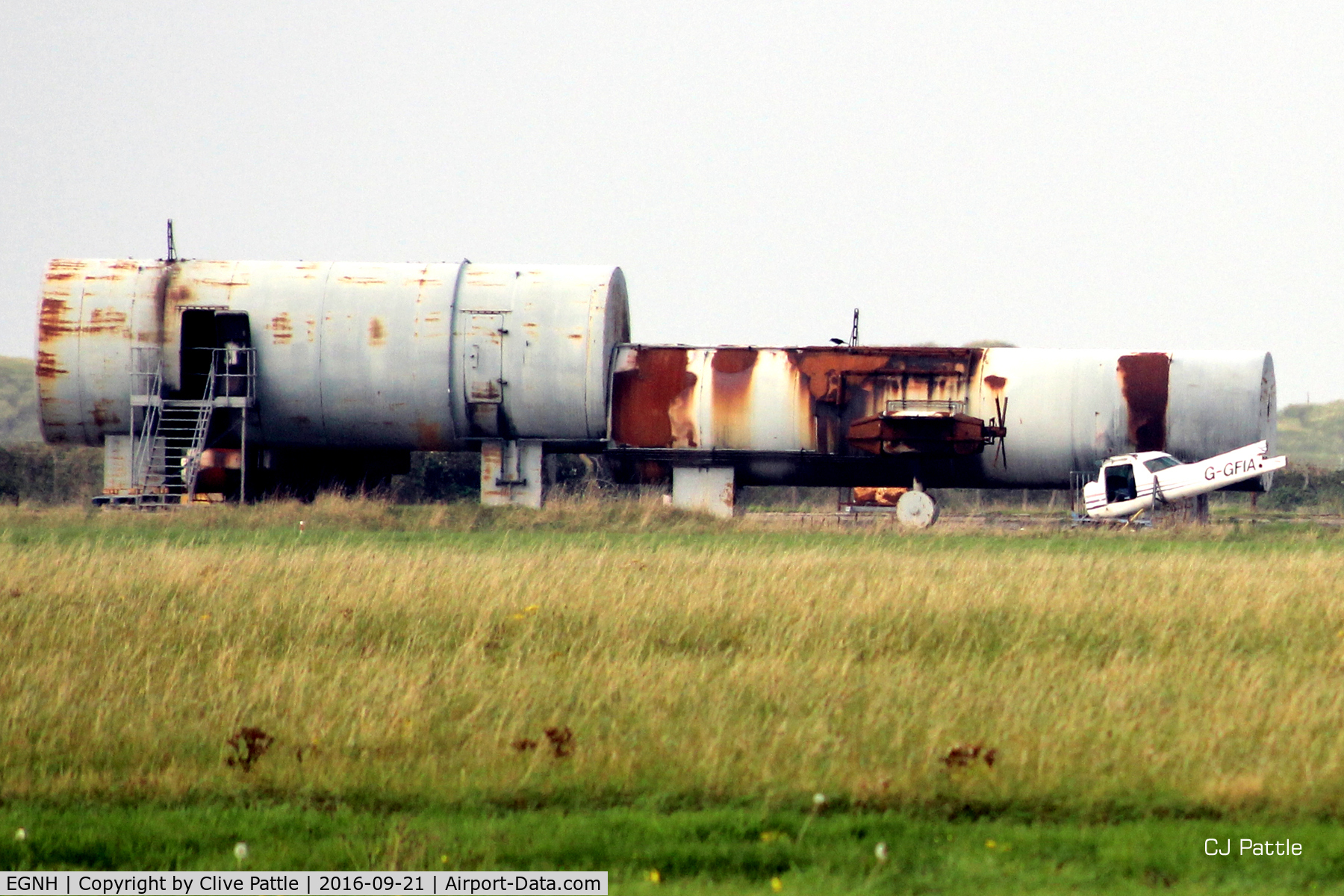 Blackpool International Airport, Blackpool, England United Kingdom (EGNH) - Blackpool EGNH - Fire training area on southside. Remains of C152 G-GFIA are visible. Dumped Cougar G-OOGS is nearby (not in shot)