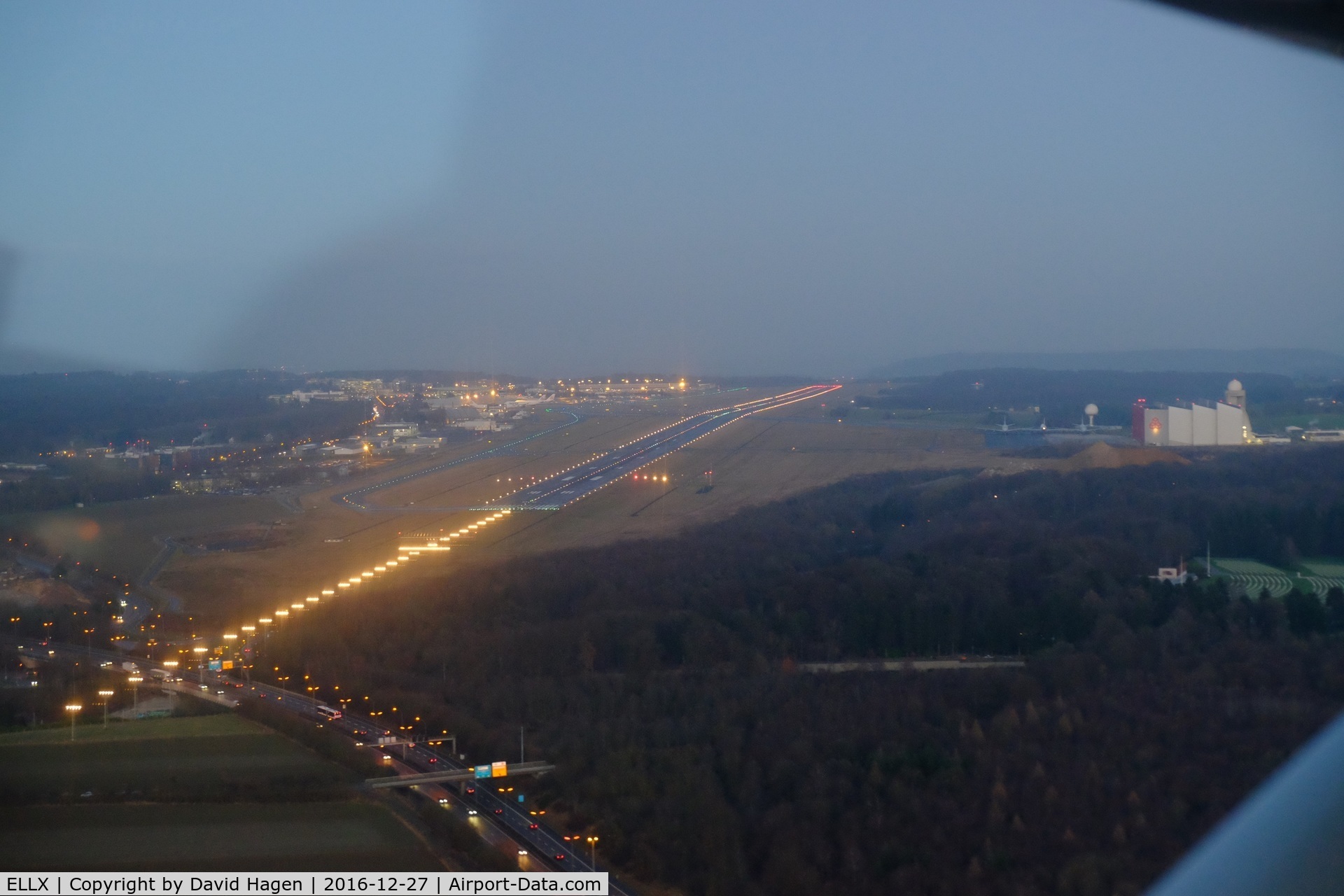 Luxembourg International Airport, Luxembourg Luxembourg (ELLX) - Turning final for runway 06 in Luxembourg at 17:00 LT after sunset in December.
