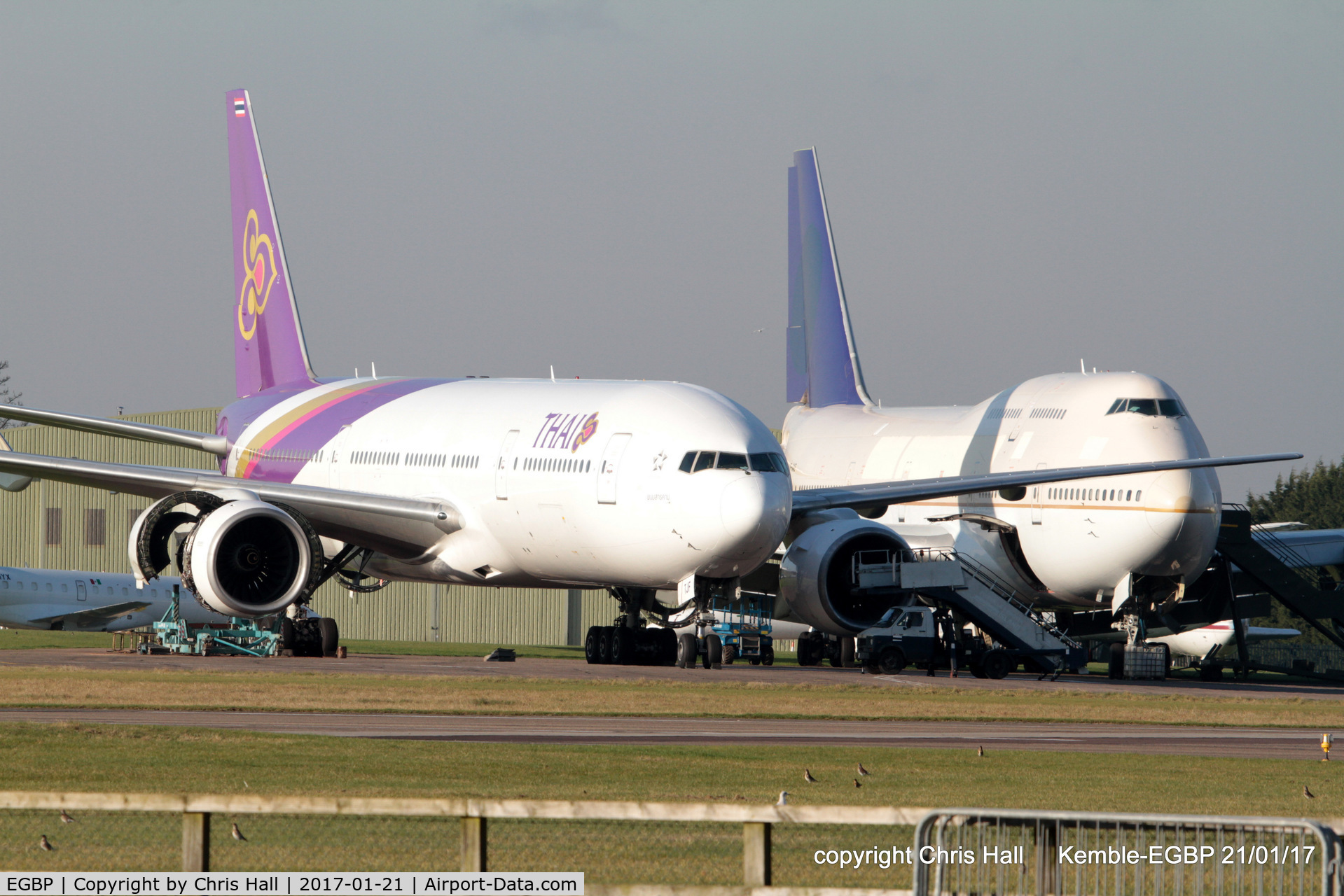 Kemble Airport, Kemble, England United Kingdom (EGBP) - Thai B777 and Saudi B747 in storage at Kemble