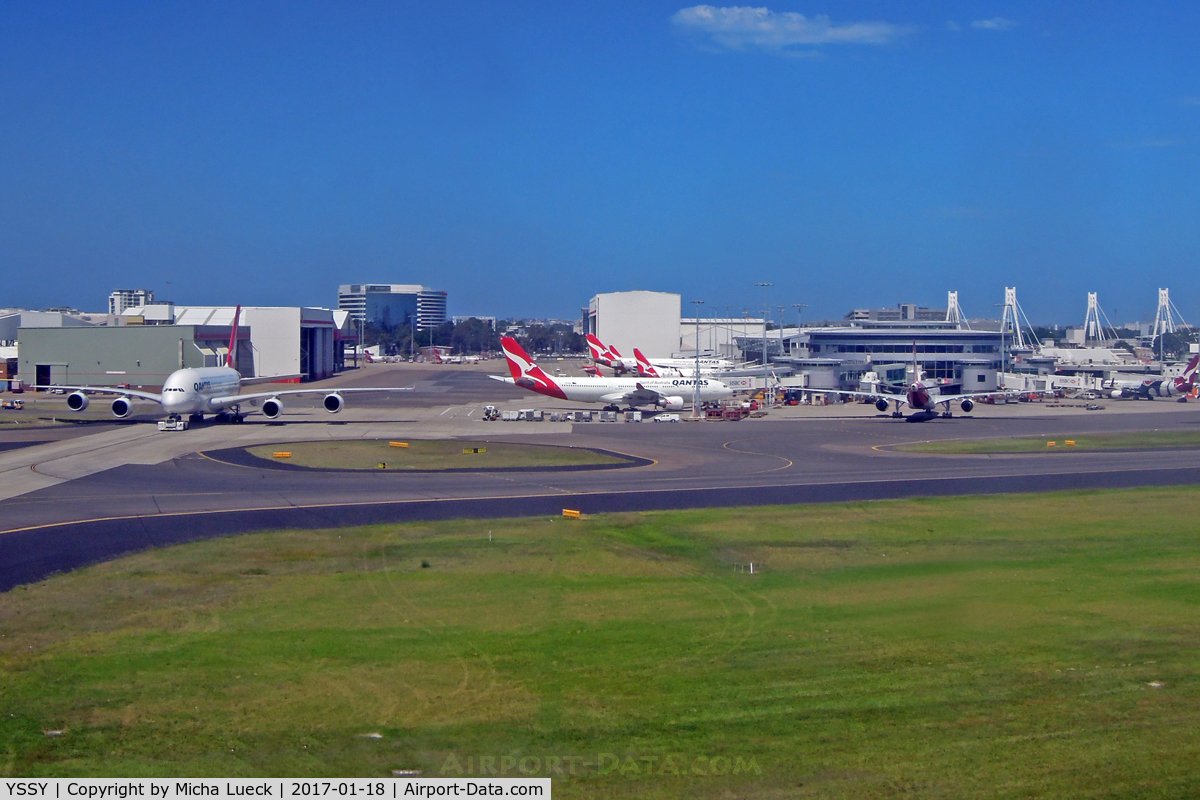 Sydney Airport, Mascot, New South Wales Australia (YSSY) - QF maintenance base on the left, and QF domestic terminal on the right