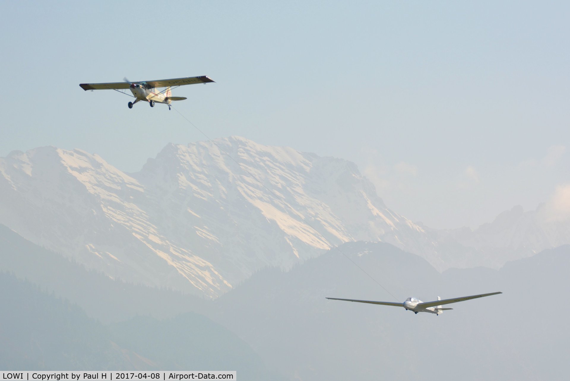 Innsbruck Airport, Innsbruck Austria (LOWI) - Towing a glider out off LOWI, Innsbruck with the austrian alps in the background