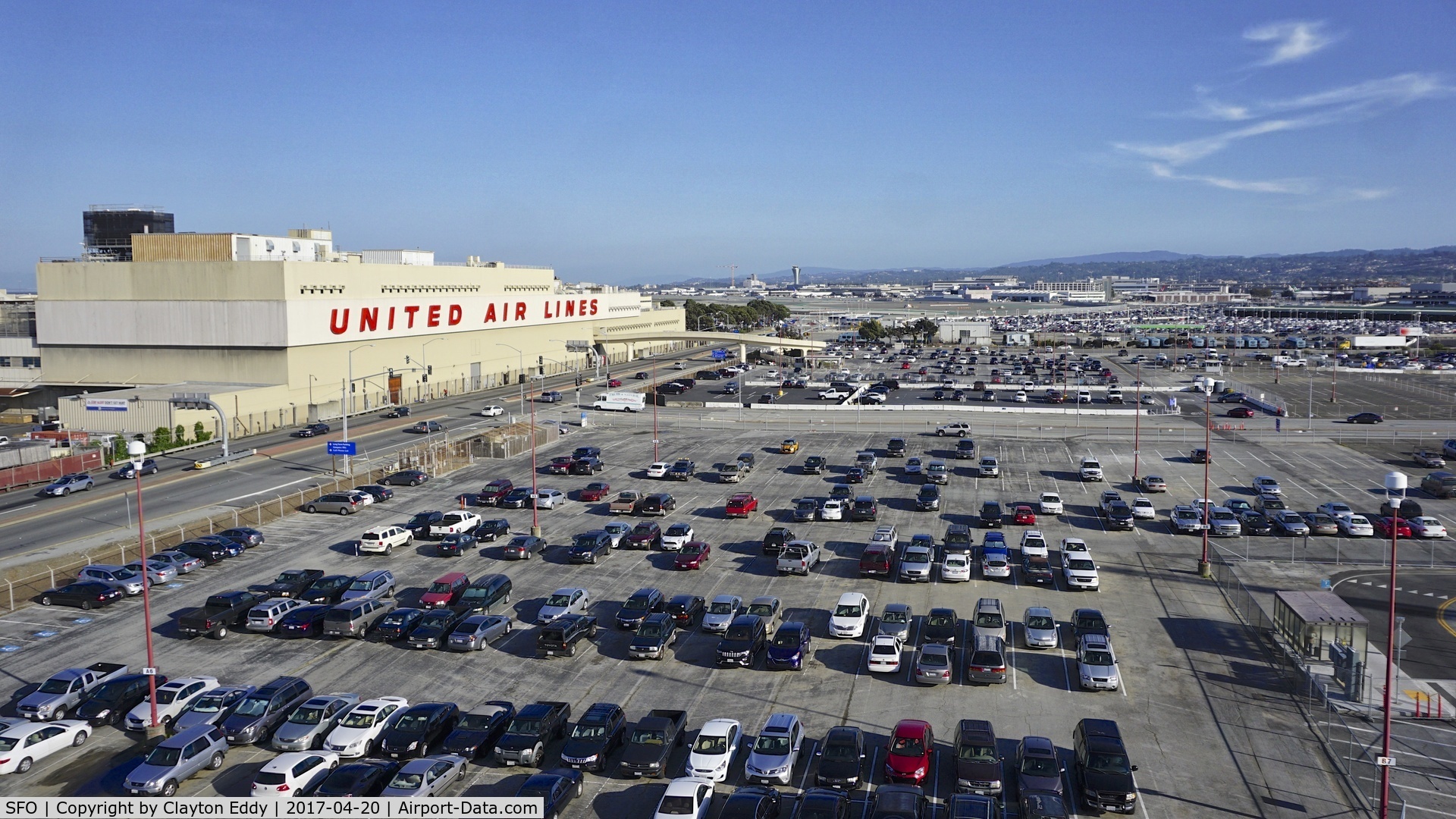 San Francisco International Airport (SFO) - United Airlines maintenance base, and the dismantling of the old ATC towers in the background. 2017.