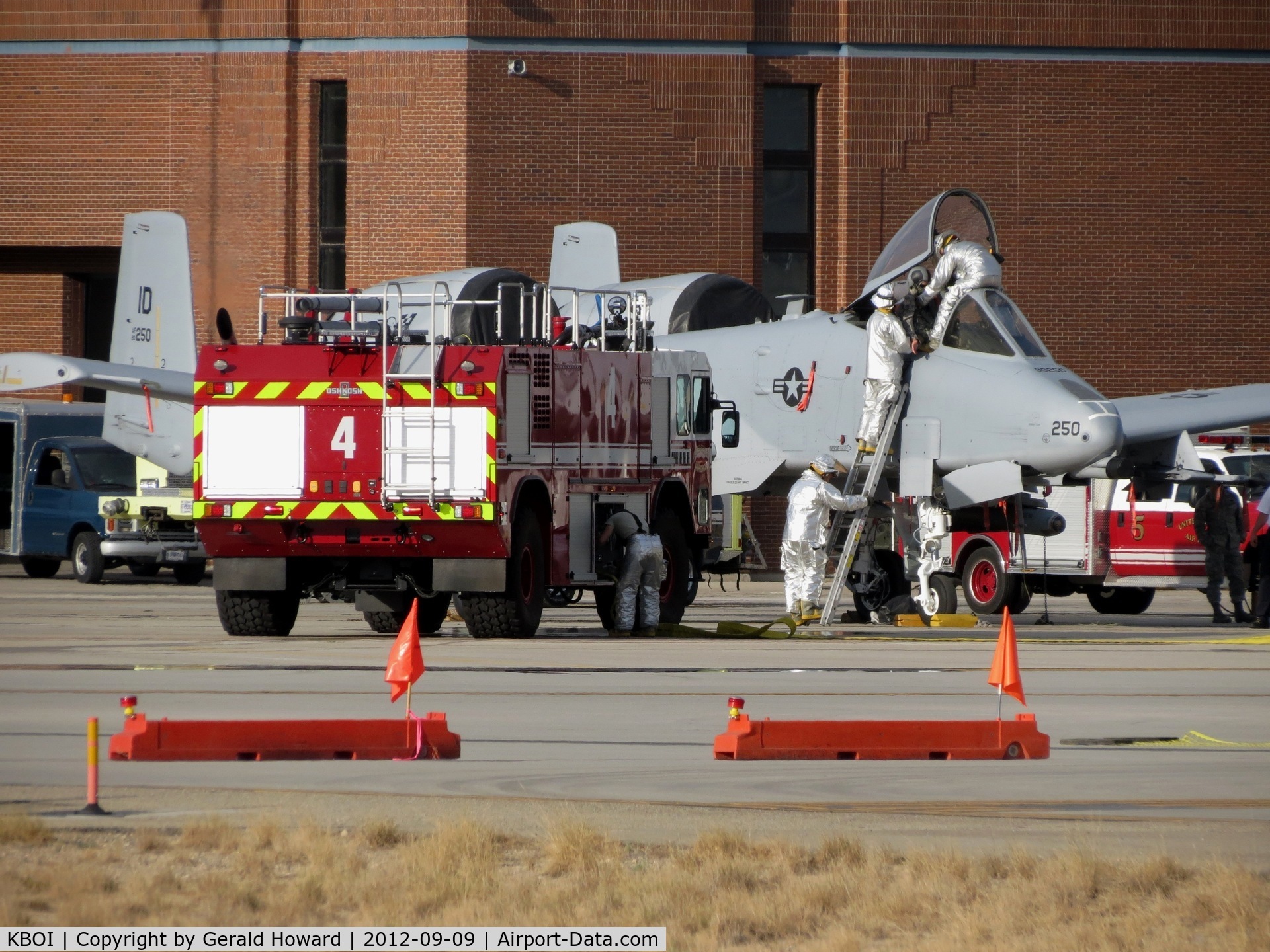 Boise Air Terminal/gowen Fld Airport (BOI) - Idaho ANG fire fighter practice a rescue on an A-10 pilot.