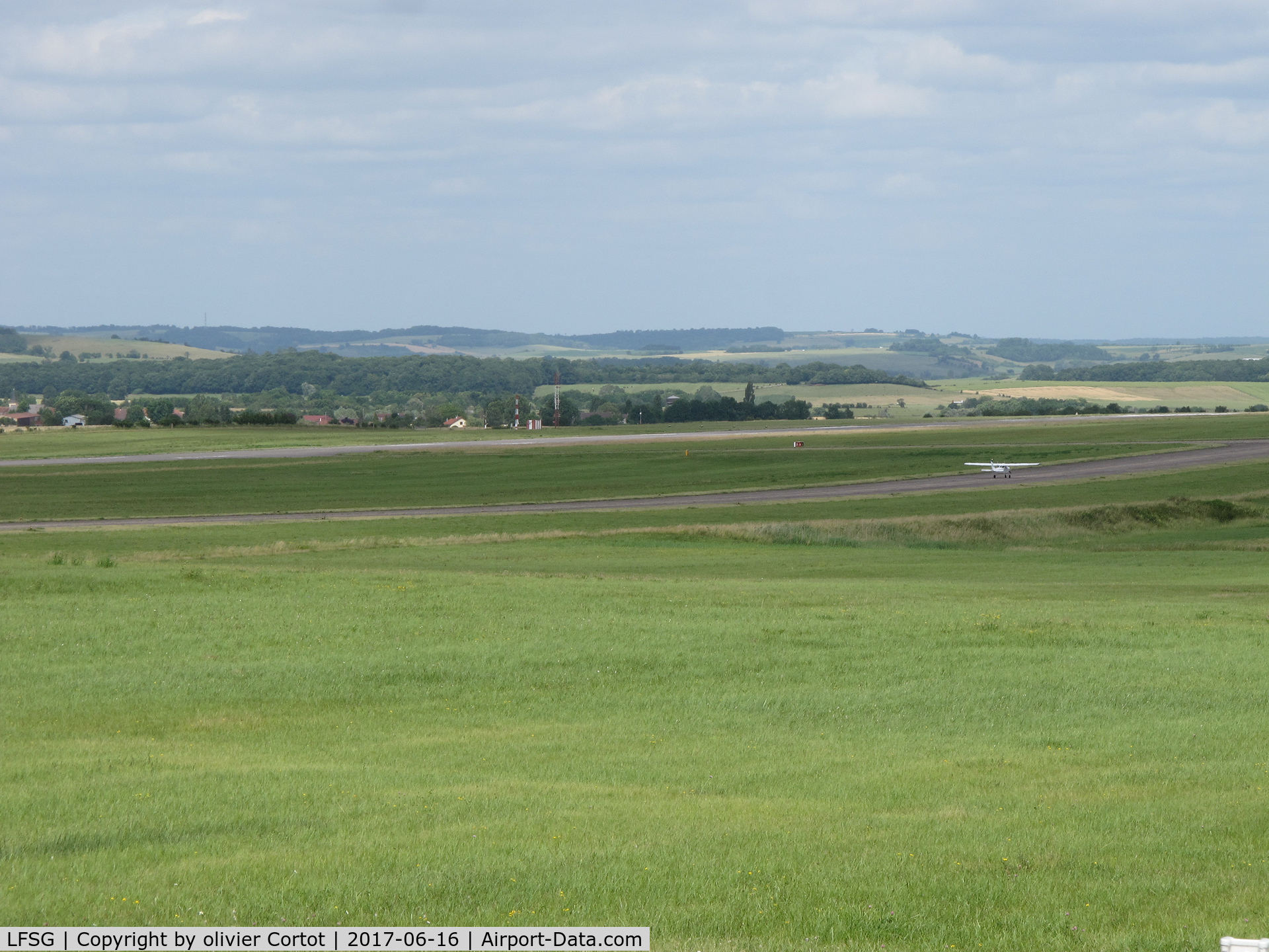Épinal Mirecourt Airport, Épinal France (LFSG) - the taxiway and the runway on the left. Mirecourt is an ex NATO military airfield