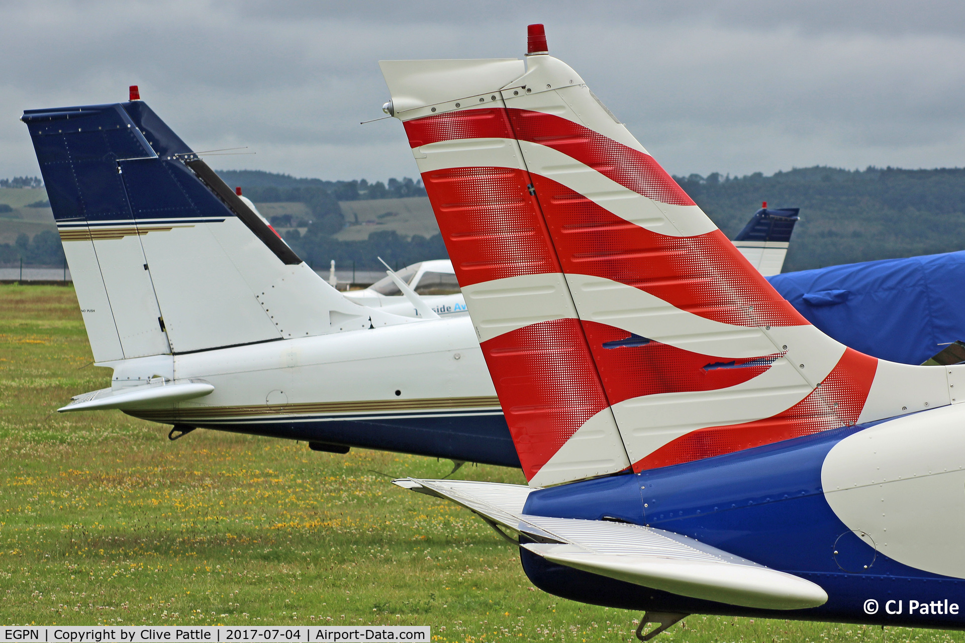 Dundee Airport, Dundee, Scotland United Kingdom (EGPN) - PA-28 tails at Dundee EGPN