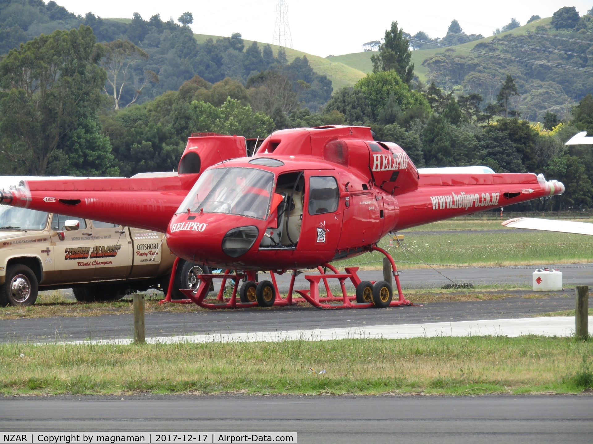 Ardmore Airport, Auckland New Zealand (NZAR) - pair of helis on maintenance apron