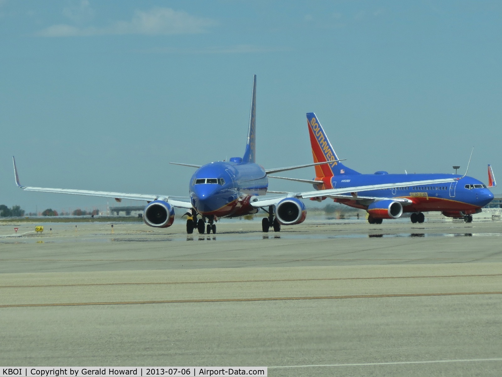 Boise Air Terminal/gowen Fld Airport (BOI) - N204WN leaving the gate as N466WN arrives to take its place.