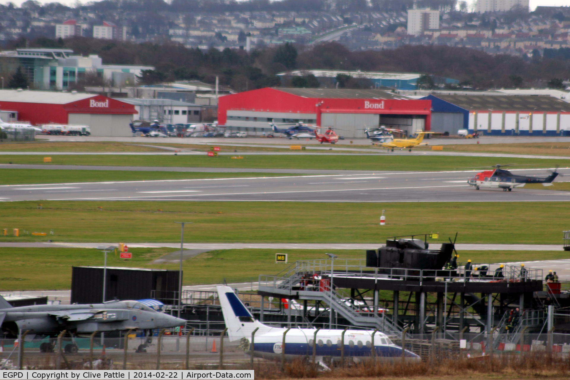 Aberdeen Airport, Aberdeen, Scotland United Kingdom (EGPD) - Airport view - Fire training area in the foreground with BAe Jetstream T.2 and Sepecat Jaguar on show.