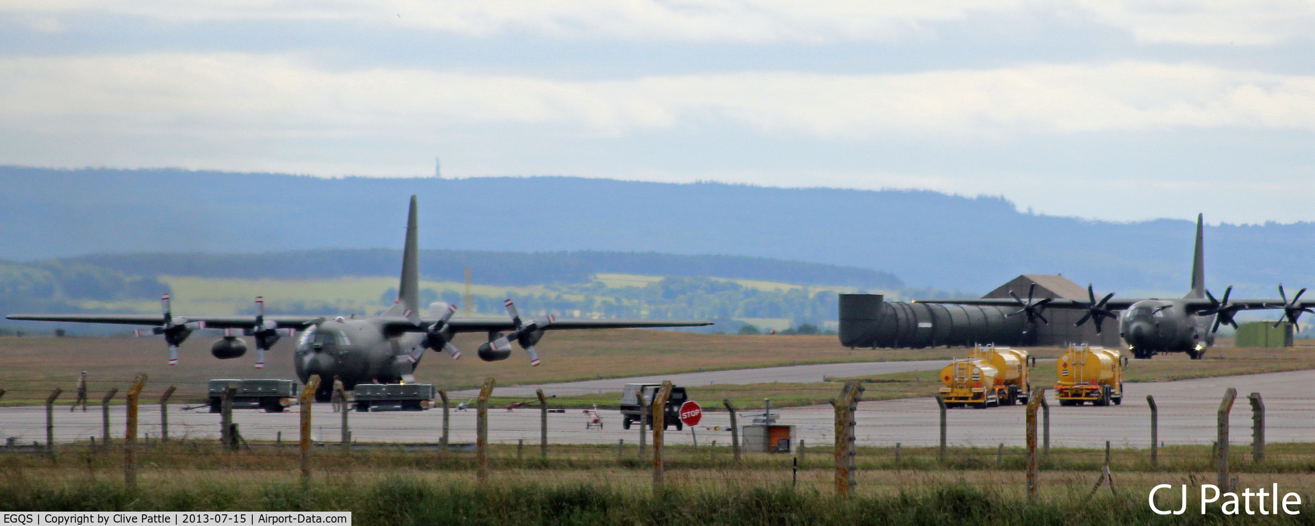 RAF Lossiemouth Airport, Lossiemouth, Scotland United Kingdom (EGQS) - Two RAF Hercules taxy on the airfield