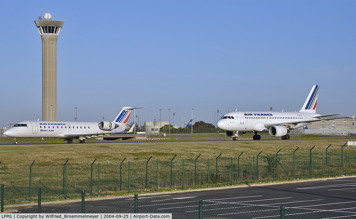 Paris Charles de Gaulle Airport (Roissy Airport), Paris France (LFPG) - F-GRJT - Air France (Brit Air) CRJ 200 and F-GRHR - Air France Airbus A319