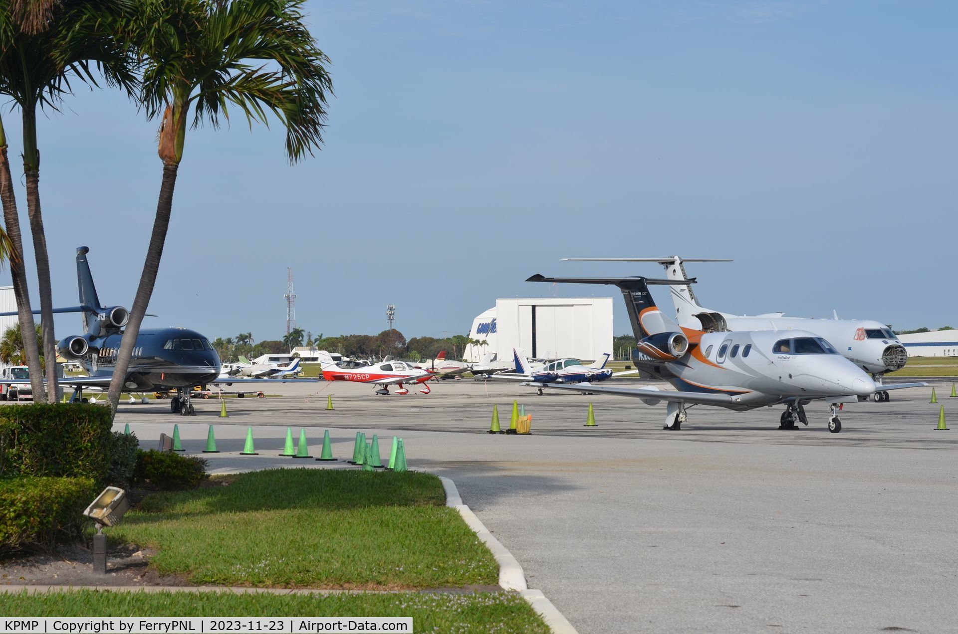 Pompano Beach Airpark Airport (PMP) - Pompano apron seen from the parking lot next to the terminal