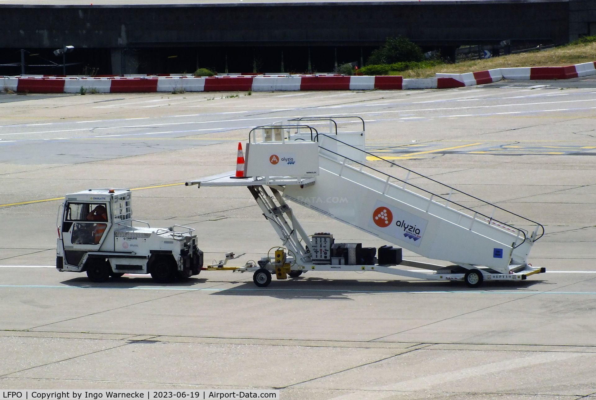 Paris Orly Airport, Orly (near Paris) France (LFPO) - open boarding stairs being towed at Paris/Orly airport