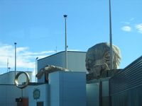 Wellington International Airport, Wellington New Zealand (WLG) - Gollum/Smeagol reaching for Frodo's ring on top of Wellington's Terminal Building - by Micha Lueck