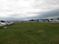 Frederick Municipal Airport (FDK) - The trnscient flight line on AOPA Fly-in day 2006 - by Sam Andrews