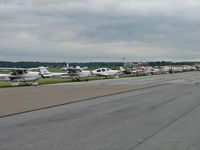 Frederick Municipal Airport (FDK) - IF the weather had been better the morning of the 2006 AOPA Fly-In I'm certain there would have been more airplanes.  There were more to my left and behind but there would have been more - by Sam Andrews