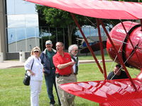 Frederick Municipal Airport (FDK) - One of the icons of the airport. Phil Boyer; Pres. AOPA (red shirt) checking out one of the former AOPA sweepstakes planes that flew in for the 2006 AOPA Fly-In. - by Sam Andrews