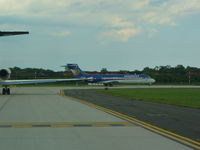 General Mitchell International Airport (MKE) - Holding short Runway 25L - by Mark Pasqualino