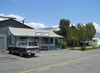 Santa Paula Airport (SZP) - SZP Airport Office and shaded picnic tables - by Doug Robertson