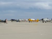 Castle Airport (MER) - T-6/SNJ flight-line (T-28s in background) at 2006 West Coast Formation Clinic held on expansive old SAC ramp @ Castle AFB - by Steve Nation