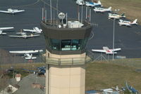 Republic Airport (FRG) - A close flyby of the tower approaching the Bravo runup area.... - by Stephen Amiaga