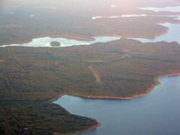 Mc Kenzie Field Airport (6TE9) - McKenzie private strip, looking east at 3000' over Lake of the Pines - by Barry Taylor