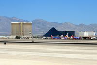 Mc Carran International Airport (LAS) - Looking northwest from the Sunset Viewing Area at McCarran Int'l Airport. - by Dean Heald