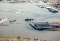 St Paul Downtown Holman Fld Airport (STP) - ~1995 flood at STP.  The Mississippi River floods this airport so often the airport has a procedures manual.  They will even preflood some of the buildings because it's easier to clean up afterwards. - by Timothy Aanerud