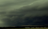 Daytona Beach International Airport (DAB) - Looking Southwest over the airfield at a nasty summer storm - by Florida Metal