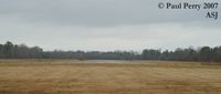 Tri-county Airport (ASJ) - Ground level view down Runway 01 - by Paul Perry
