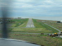 Tangier Island Airport (TGI) - The famous hump is at about the 5th center line stripe. - by Sam Andrews