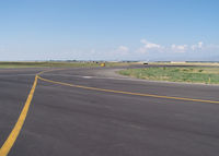 Fort Collins-loveland Municipal Airport (FNL) - View of taxi way...looking West - by Bluedharma