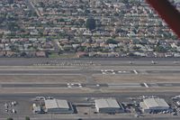 Compton/woodley Airport (CPM) - Downwind abeam the numbers for landing on RWY 25L in a 1946 Aeronca Champ (NC1659E). - by Dean Heald