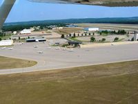 Cherry Capital Airport (TVC) - General Aviation Terminal.  The facility is open but not being used.  The FBO office (Harbour Air) is a few hangars north. - by Bob Simmermon