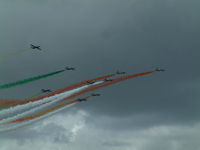 RAF Fairford Airport, Fairford, England United Kingdom (FFD) - Frecci Tricolori displaying at RIAT Fairford 2003. - by Steve Staunton