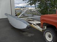 Lake Hood Seaplane Base (LHD) - Highly modified truck with capability to position straight-float plane aircraft out of water. Closeup of carrier body with float set only. - by Doug Robertson