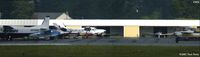 Coastal Carolina Regional Airport (EWN) - Multiple exposure composite of the ramp - by Paul Perry
