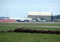 Newquay Cornwall International Airport / RAF St. Mawgan - Two Skybus Twin Otters on the apron waiting to start the days work - by Terry Fletcher