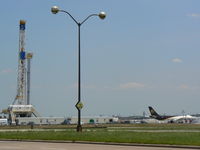 Dallas/fort Worth International Airport (DFW) - Gas well drilling rig near UPS ramp - by Zane Adams