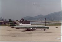 Hong Kong International Airport, Hong Kong Hong Kong (HKG) - Cathay Pacific Cargo B707-320C,China Airlines B727 and Cargolux B747(on runway)HKG Kai Tak Airport,Sept.1979 - by metricbolt