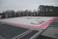 Carolina Kidney Heliport (5NC0) - You would nave to really be on the stick to set er' down here.  Wow.  Not only the height to throw you off but it shaking too! - by J.B. Barbour
