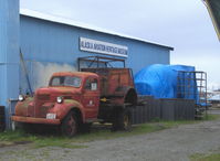 Lake Hood Seaplane Base (LHD) - Utility truck and one of the hangars-Alaska Aviation Heritage Museum - by Doug Robertson