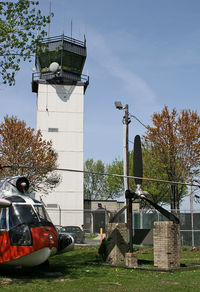 Teterboro Airport (TEB) - This is the old tower, located on the southeastern corner of the airfield.  It has since been replaced by a more modern unit on the other side.  In the foreground is the Aviation Hall of Fame of New Jersey. - by Daniel L. Berek